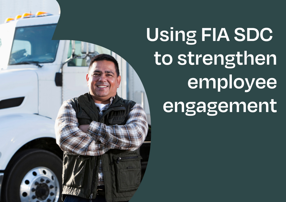 Using FIA SDC to strengthen employee engagement. A smiling man standing in front of a white truck.